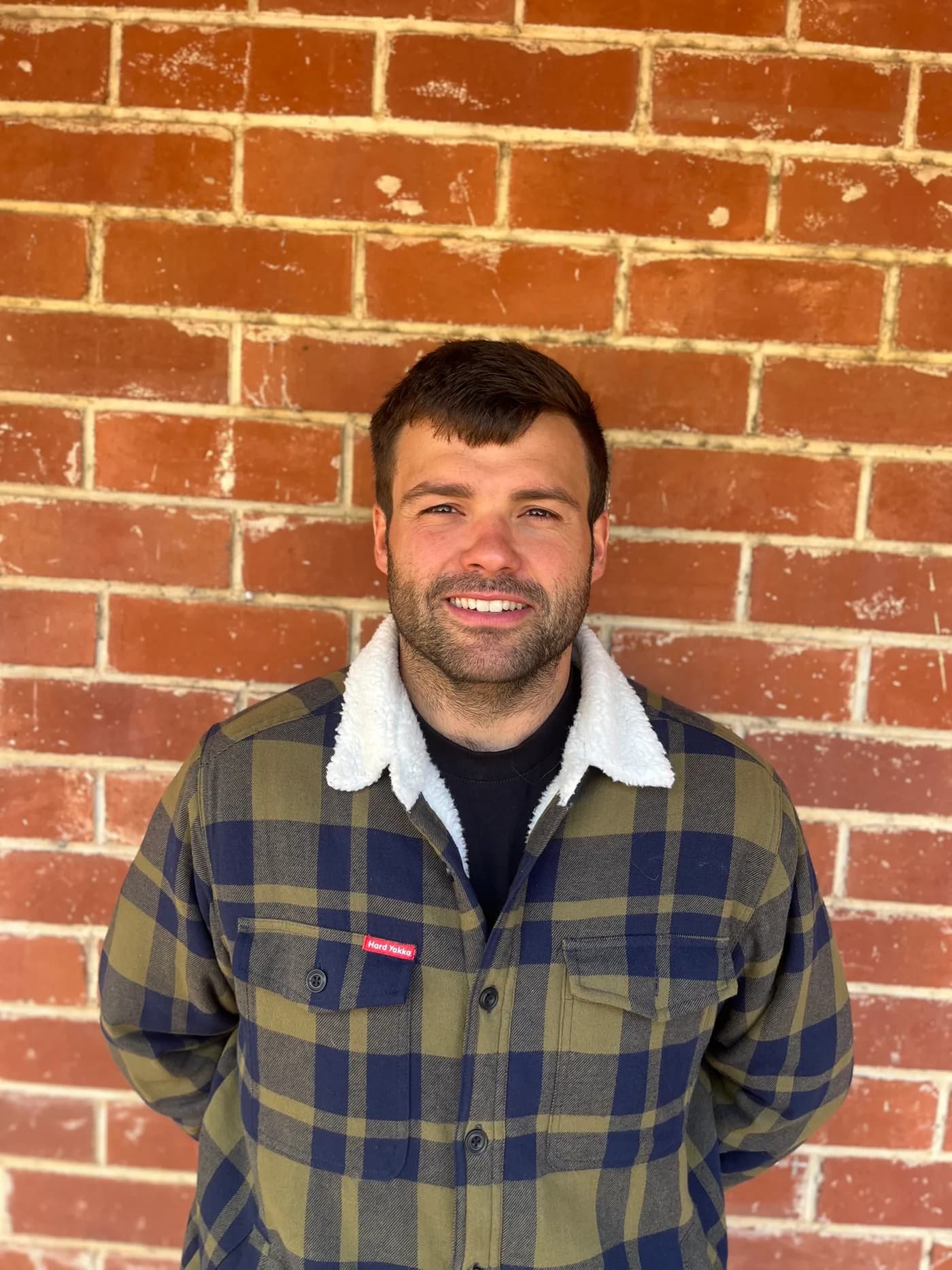 Gregg Miller, licensed plumber and gas fitter, in a Hard Yakka jacket