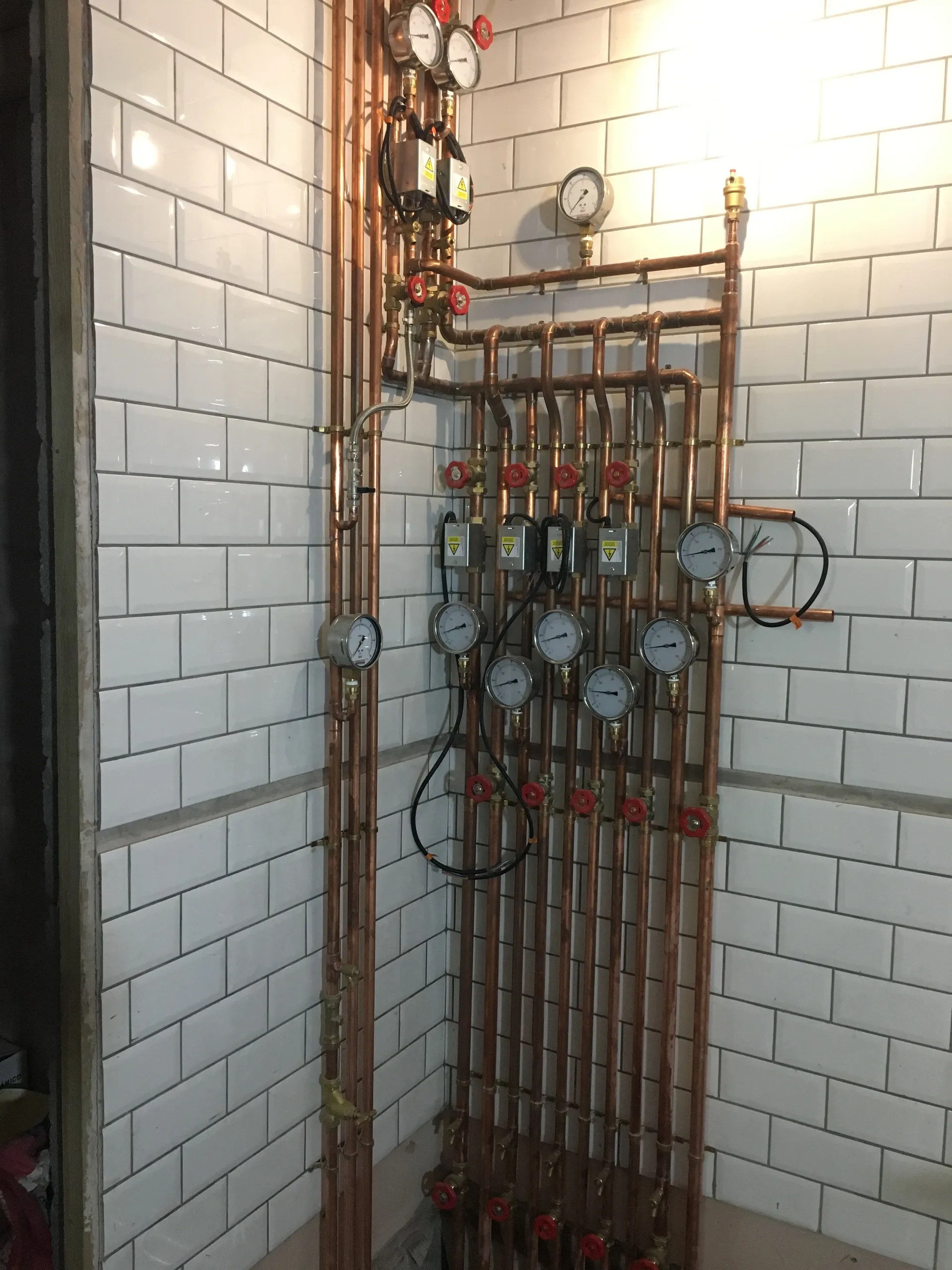 Copper heating manifold and plant room - copper heating manifold