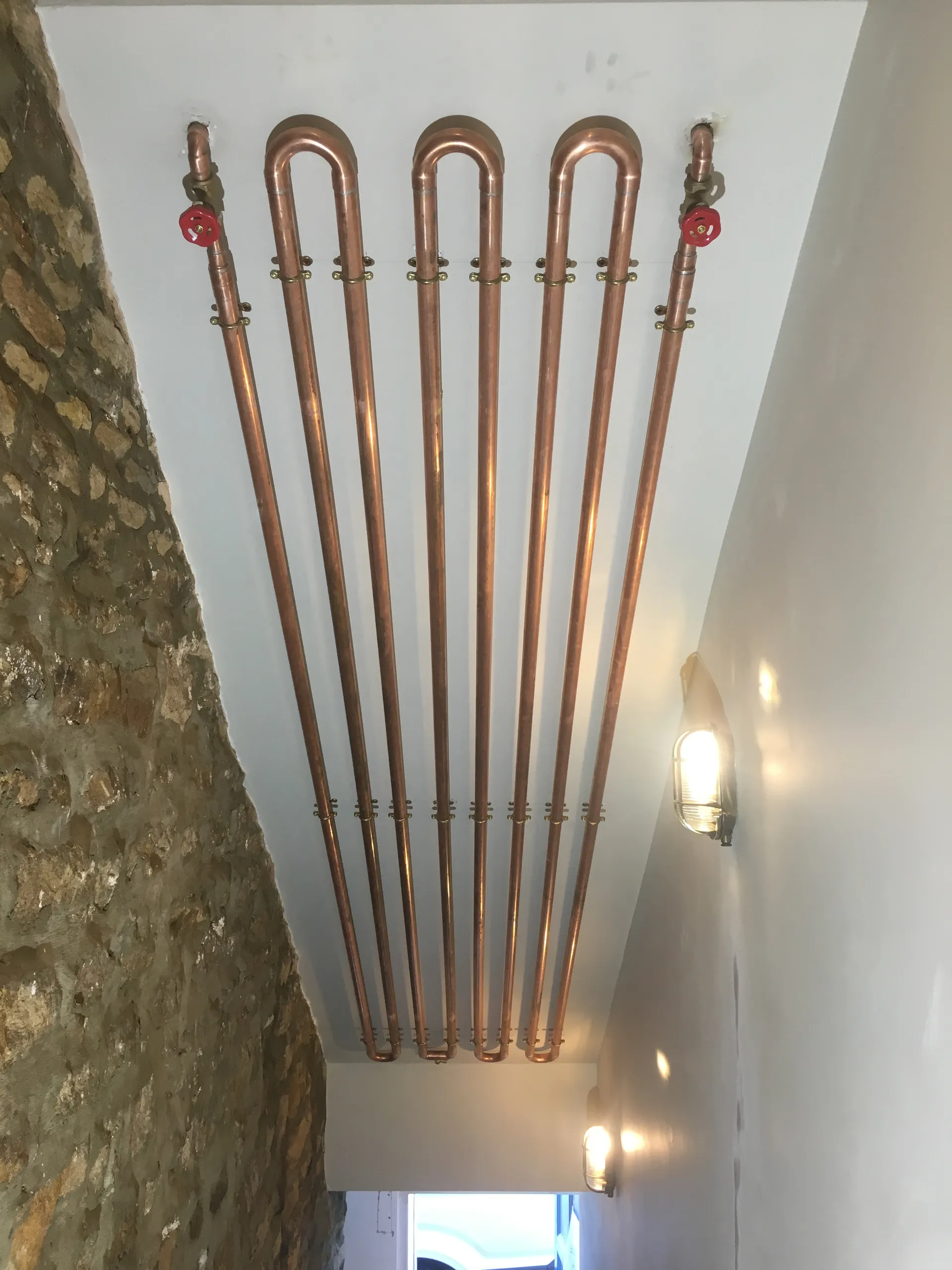 Copper heating manifold and plant room - copper pipework feature wall