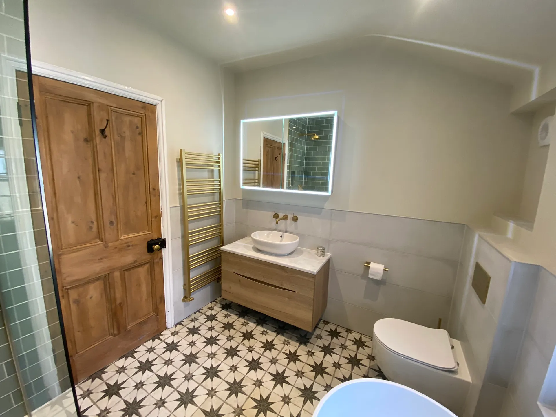 Sage-green bathroom with brass fittings - sage green bathroom brass vanity